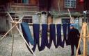 A local custom -- we saw many of these long cloth ribbons hanging around town.